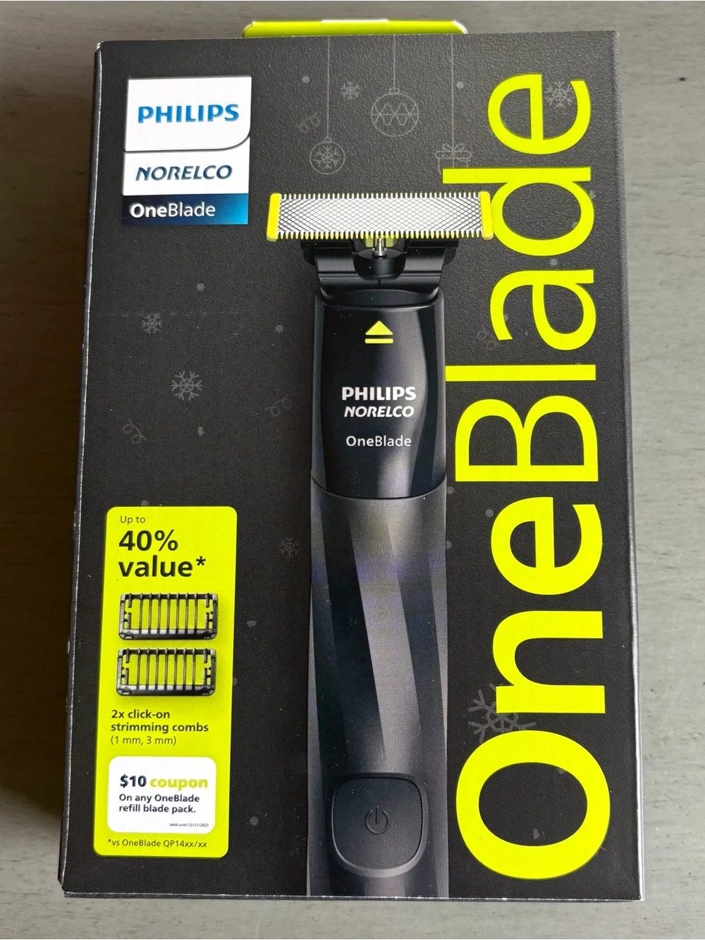 Philips Norelco OneBlade Razor- Trim, Edge & Shave - 1 Blade - 2 Combs Wet/Dry